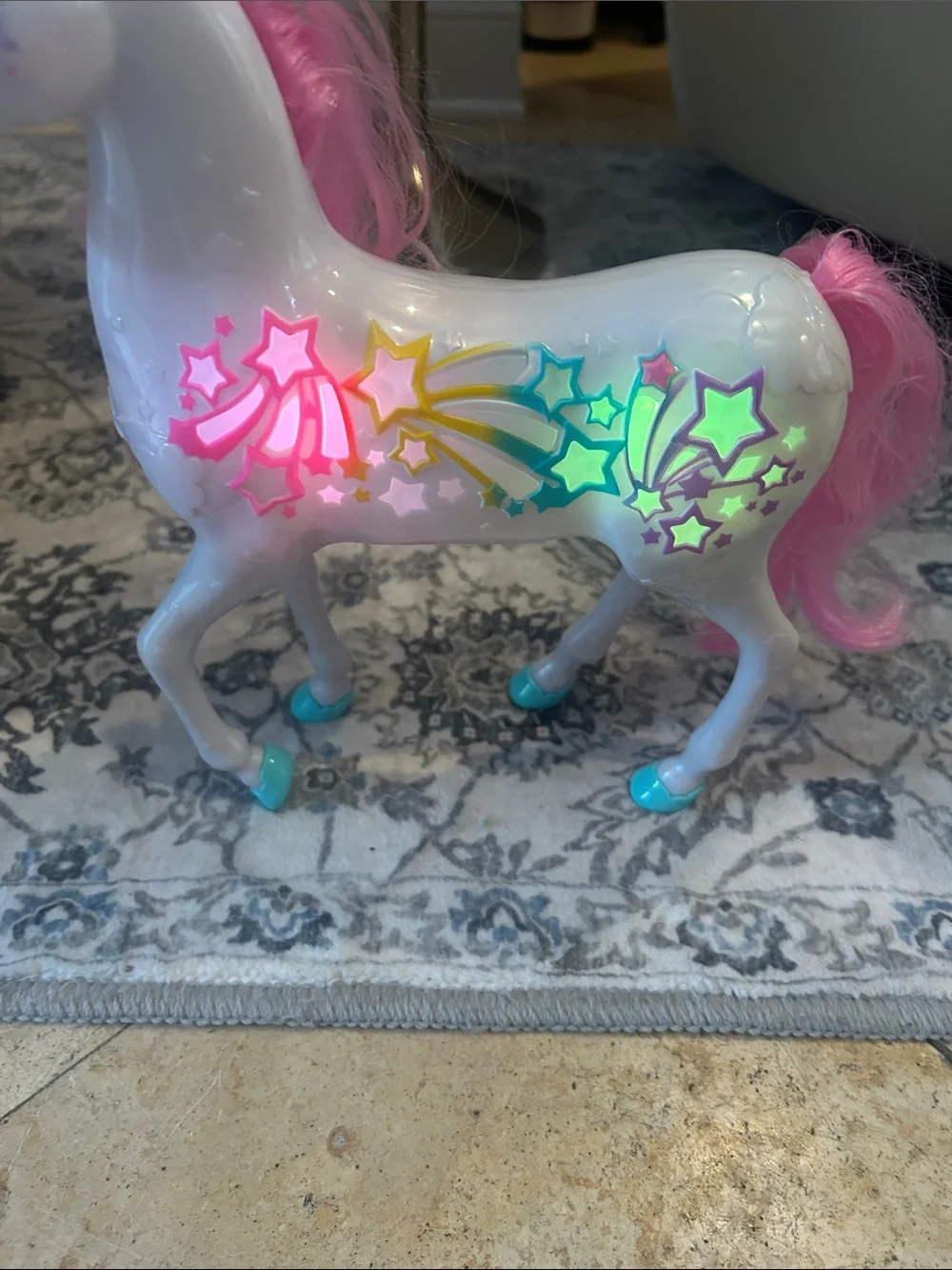 Barbie’s White and Pink- light up music Unicorn Toy with Colorful Star Decals